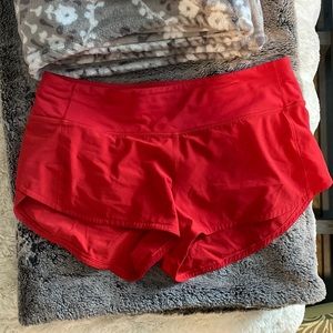 Red Lululemon shorts